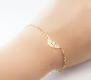 Bracelet femme plume doré