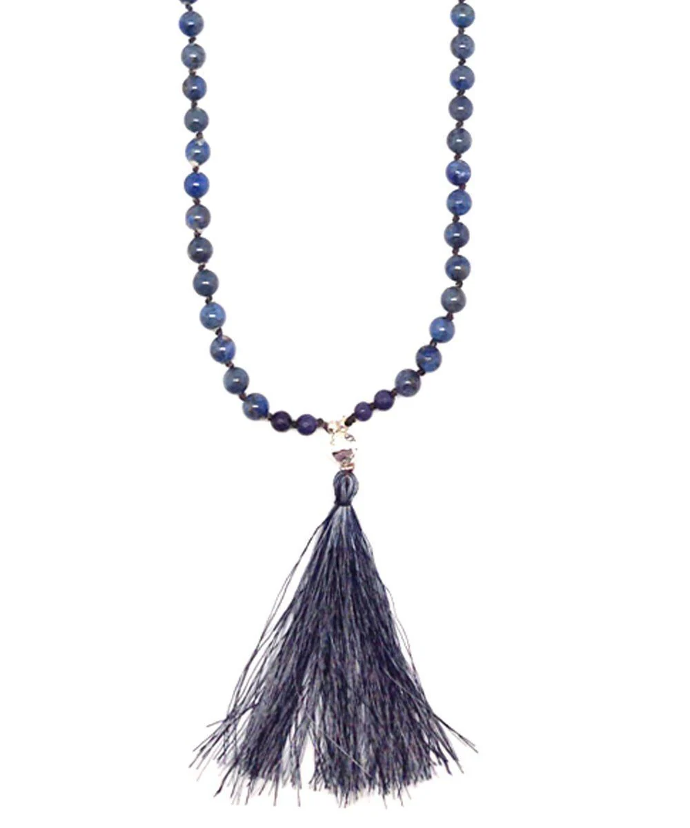 Sautoir pompon, perles de sodalite bleu jean